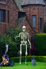 Long Beach, California, USA - October, 2020: Halloween skeleton, ghosts and graves. - 389296208