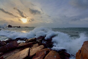 Beautiful sunset on the sea at Plougrescant in Brittany, France
