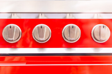 switches on the electric stove and gas stove