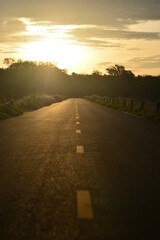 the road line to foward destination with sunlight 