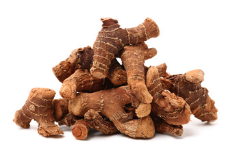 Dried galangal root isolated on white background