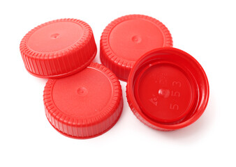 Plastic bottle screw caps isolated on white background