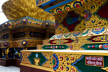 The art just below the golden statue of Buddha at Buddha Park, Swayambhunath, Kathmandu, Nepal.
