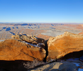 Muley Point panoramic overlook with red sandstone in foreground, early winter morning. USA, Utah.
