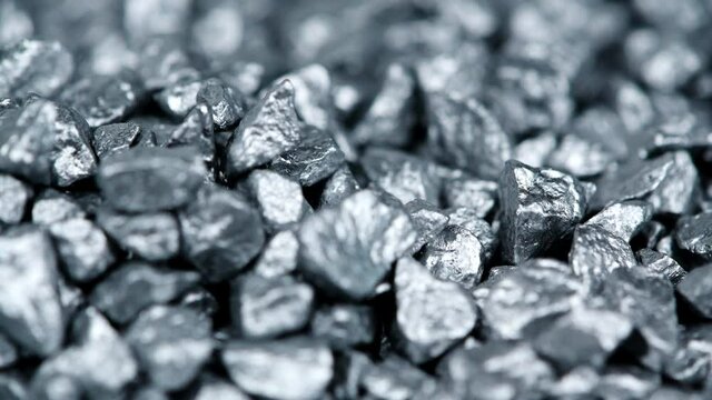 Heap of silver nuggets background (seamless loopable)