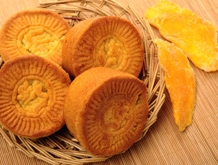 Mid-Autumn Festival moon cake on white background（Non-English texts translation :sweet red bean...