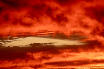 Fototapeta premium Dramatic red sunset with clouds