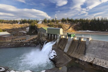Landscape View of Horseshoe Falls Dam at Bow River, Rocky Mountains Foothills west of Calgary. Massive Concrete Structure was the first sizeable hydroelectric facility in Alberta, Canada