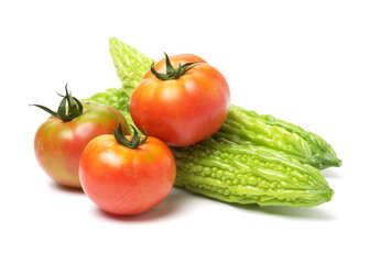 Tomato and Bitter melon ( Bitter gourd )on white background