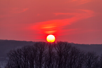 red sunset with steam cloud over the mountain in hokkaido japan