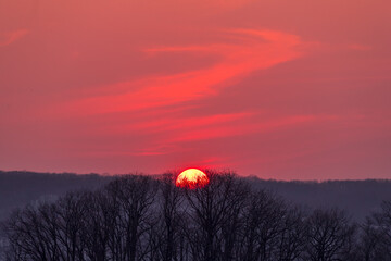 red sunset with steam cloud over the mountain in hokkaido japan