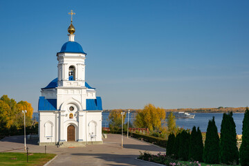 Fototapeta premium View of the Church of the Holy Theotokos of Kazan Monastery in the village of Vinnovka, on the banks of the river Volga, Samara region, Russia