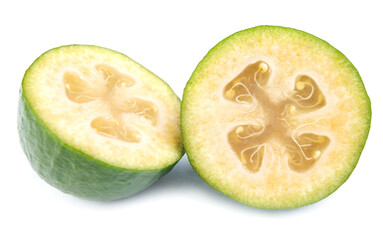 Two halves of the ripe feijoa fruit are isolated on a white background.