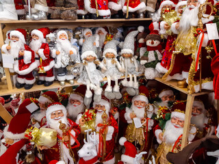 Christmas and New Year's toys on a shelf in a store. Festive winter Christmas trade