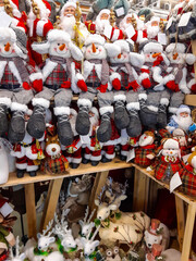 Christmas and New Year's toys on a shelf in a store. Festive winter Christmas trade