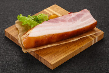 Smoked pork breast with salad leaves