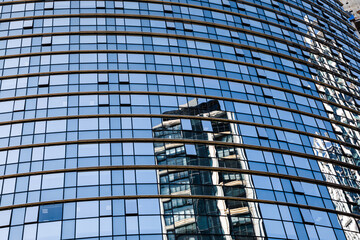 Closeup modern blue glass building