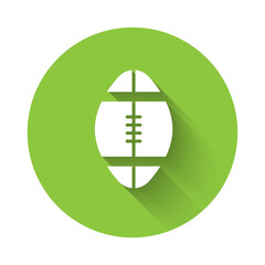 White Rugby ball icon isolated with long shadow. Green circle button. Vector Illustration.