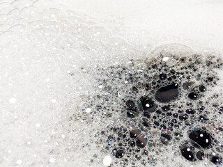 Foam bubble from soap or shampoo washing on top view