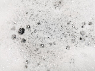 Foam bubble from soap or shampoo washing on top view