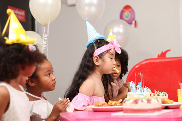 Happy birthday party event, group of adorable kids celebrate birthday party together, happy...