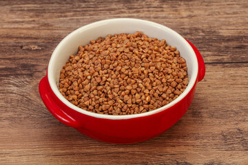 Raw buсkwheat cereal in the bowl