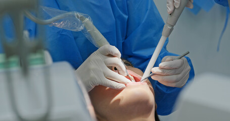 Woman undergo dental scaling treatment
