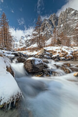Fototapeta na wymiar Rushing river in the Alps mountains