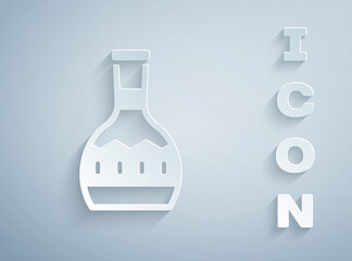 Paper cut Tequila bottle icon isolated on grey background. Mexican alcohol drink. Paper art style. Vector.