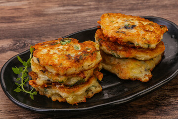 Zucchini pancakes with herbs and spices