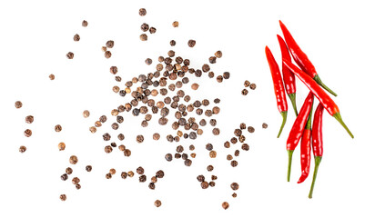 balck pepper and red chili peppers isolated on white background.