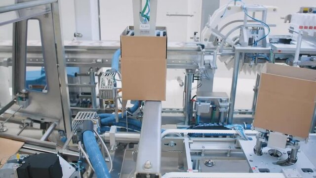 Automated machine. Conveyor line. Industrial factory. Robotic equipment. Pharmaceutical factory.