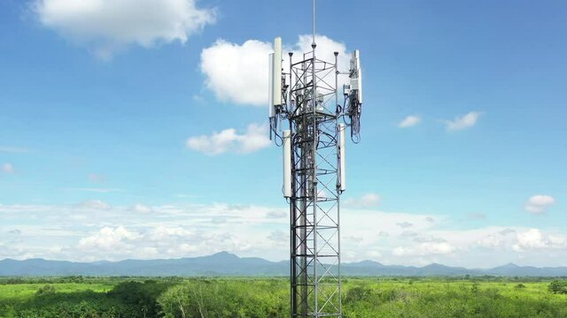 Footage 4k B-roll Aerial drone view of tower antennas Telecommunication cell phone, radio transmitters of cellular 5g 4g mobile and smartphones