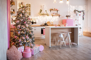 Modern Kitchen Interior with Island, Sink, Cabinets in New Luxury Home Decorated in Christmas Style.