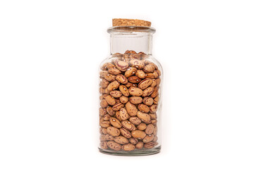 An isolated bottle of dried Borlotti Beans on a white background, food preservation. Dehydrated...
