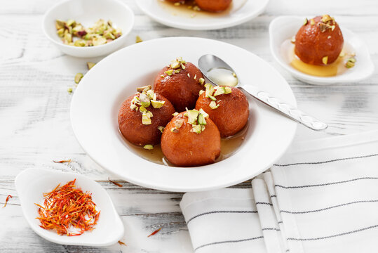 Gulab jamun traditional indian dessert.	