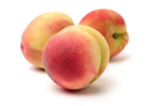 ripe peach on white background 