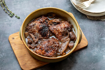 Cock au vin, French dish of chicken braised in wine