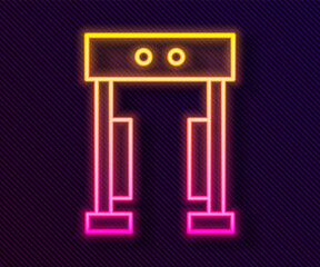 Glowing neon line Metal detector icon isolated on black background. Airport security guard on metal detector check point. Vector.
