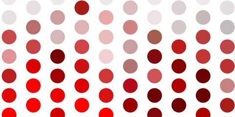 Light orange vector background with spots.
