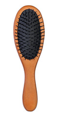 Top view on the wooden hairbrush, isolated on a white background