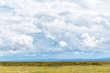 High country plateau in the wilderness with cloudscape in the sky