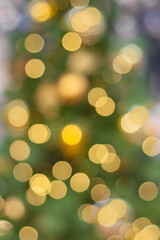 Obraz premium Abstract holiday golden light in bokeh (background)