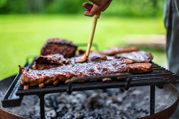 barbeque meat preparation in a summer day