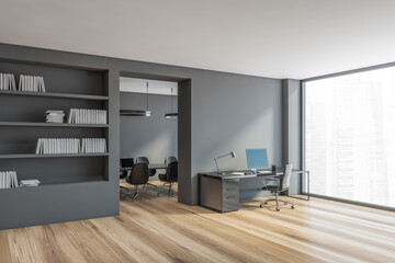 Office room, grey secretary and meeting room with armchairs and bright window