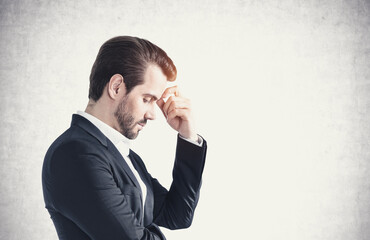 Side portrait of thoughtful young businessman, mock up