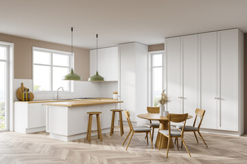 White kitchen corner with bar and table