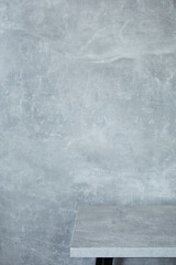 wooden table and grey wall background