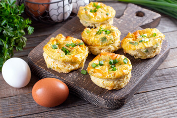 Egg bites, omelet muffin with vegetables, baked eggs with herbs, keto, ketogenic diet