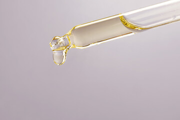 Pipette with essential oil The concept of beauty, skin care, aromatherapy, spa, cosmetology....